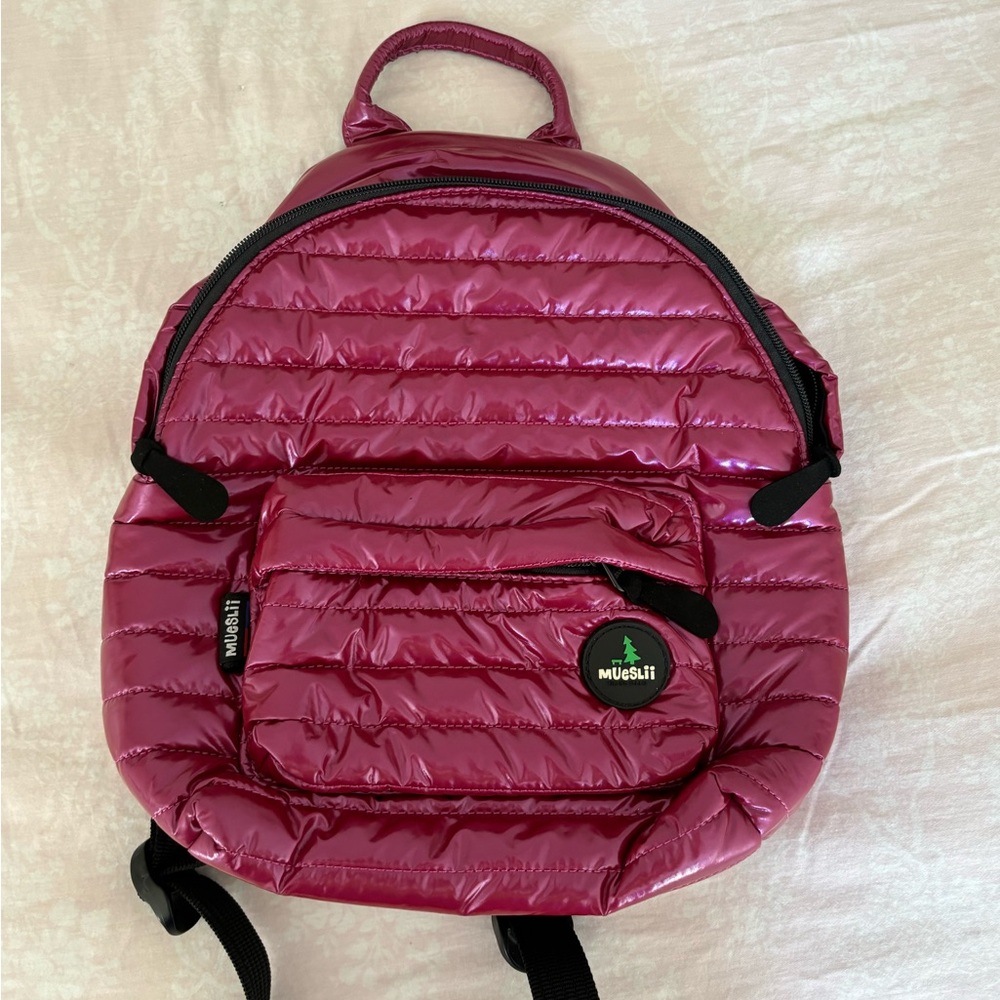 Small pink shiny backpack
